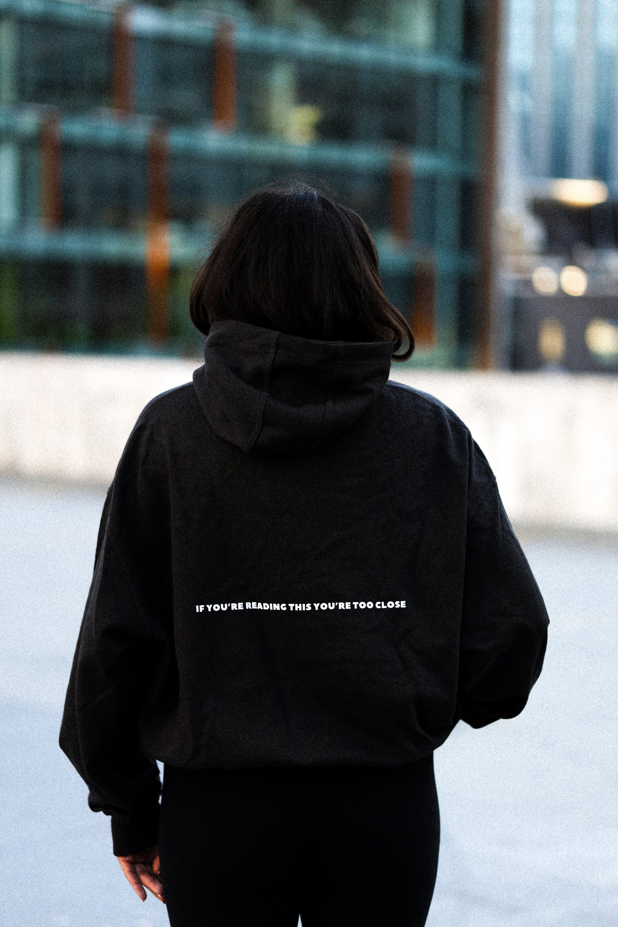 "If you're reading this you're too close" Cropped Hoodie